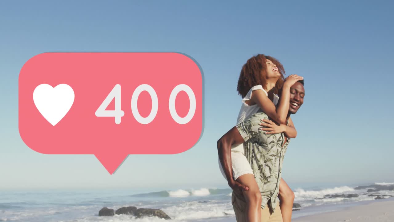 animación de la burbuja de habla con el icono del corazón y los números sobre el hombre que lleva a la mujer a hombros en la playa