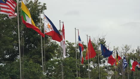 a selection of flags fluttering in the wind