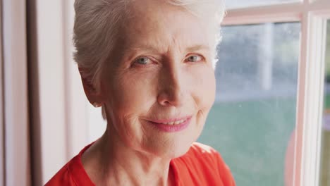 Senior-Caucasian-woman-smiling-and-looking-at-the-camera