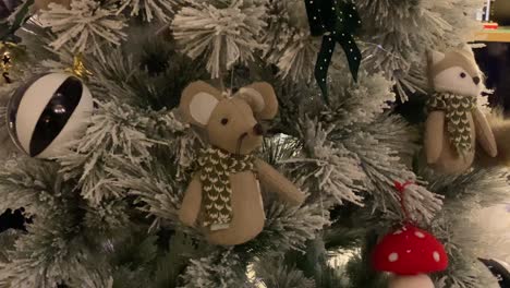 Close-Up-Shot-Of-Cute-Items-Hanged-On-Christmas-tree