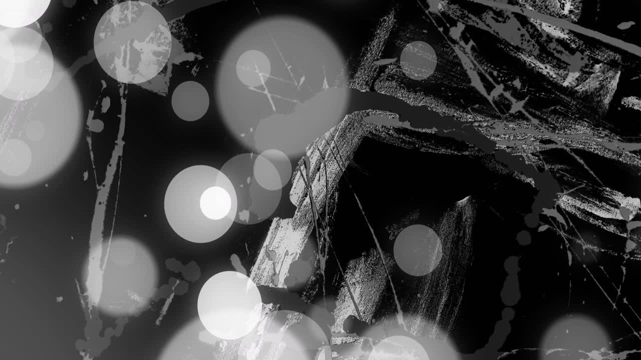 Animation of grey and white circles of light over moving white brush strokes on black background