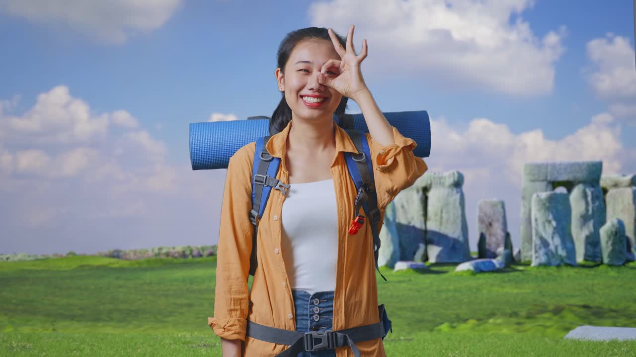 Happy Tourist Woman at Stonehenge
