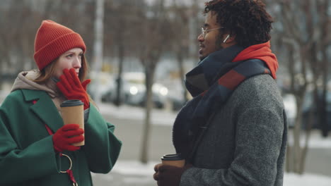couple talking outdoors in winter