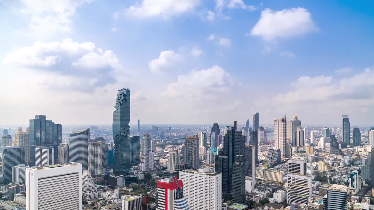 Bangkok business district city center above Silom area, with cloud pass over buildings and skyscrapers – Time Lapse