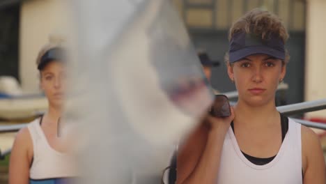 female rowing team training on a river