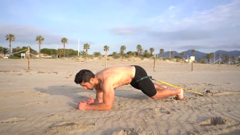 shirtless-athlete-preparing-to-perform-resistance-exercise-with-weight