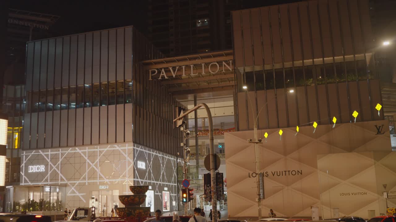 Profile view of Pavilion shopping mall with luxury brands at Kuala Lumpur, Malaysia during night.