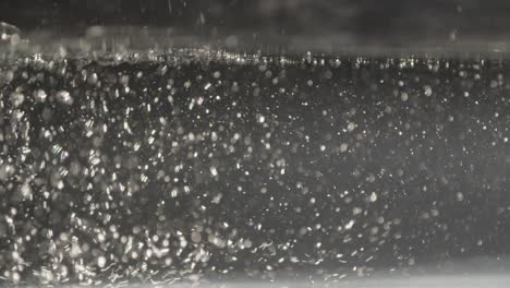 air bubbles rushing through water