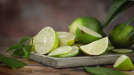 sliced juicy lime with leaves rotates slowly.