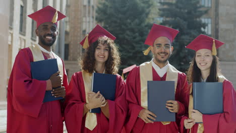 group of graduates posing for photos