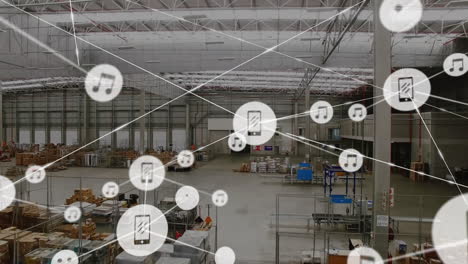 animation of network of media icons over goods storage warehouse