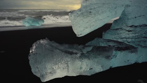 slow motion shots of blue icebergs on diamond beach in iceland