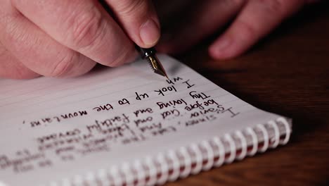 business man signing contract paperwork with elegant fountain pen