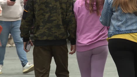 teenagers walking in city street