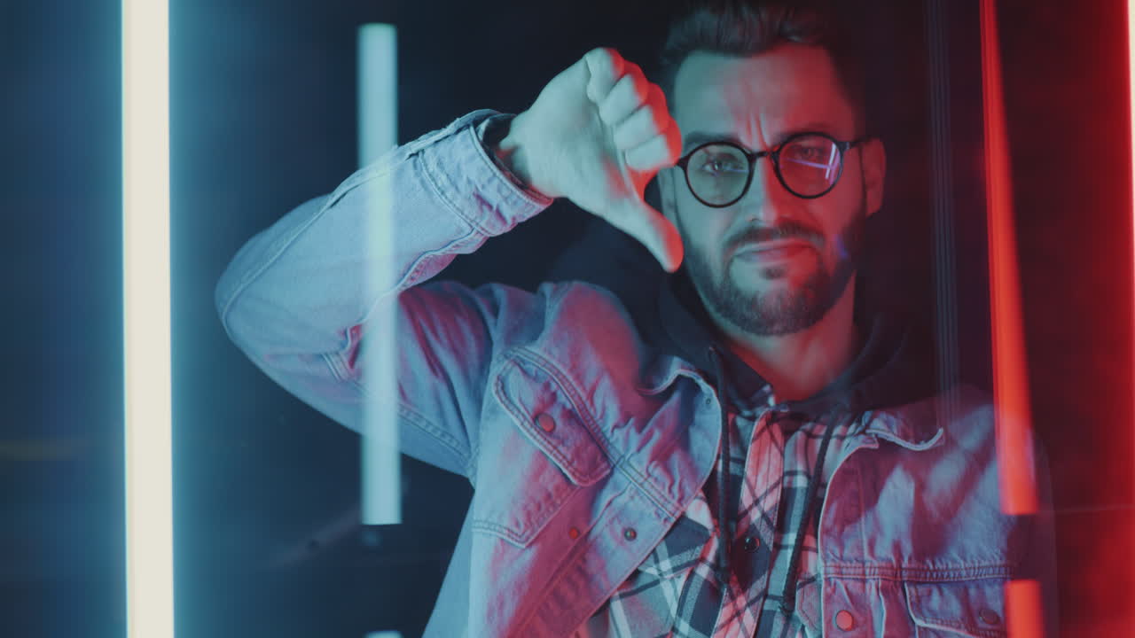 Man in Neon Light with Glasses