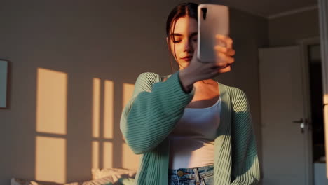 woman in a light green cardigan