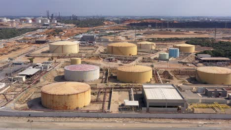 aerial footage over fuel tanks close to power plant