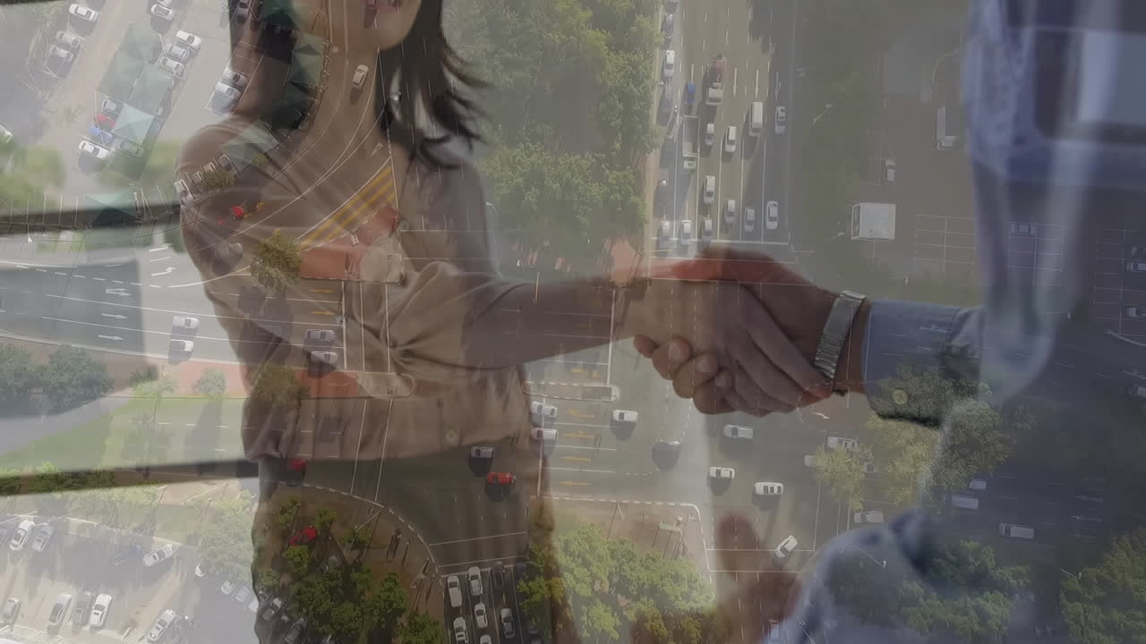 animación de un hombre de negocios apretando la mano sobre el paisaje urbano