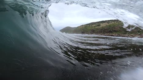 slow motion gopro pov point of view surfing bodyboarding ocean barrel wave on shallow reef central coast nsw australia 1920x1080 hd