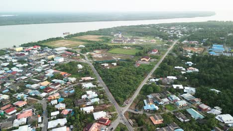 aerial drone view during summer kabong fishing village,with river and beach,sarawak,borneo