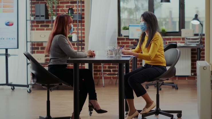 Business employee meeting with applicant at job interview appointment