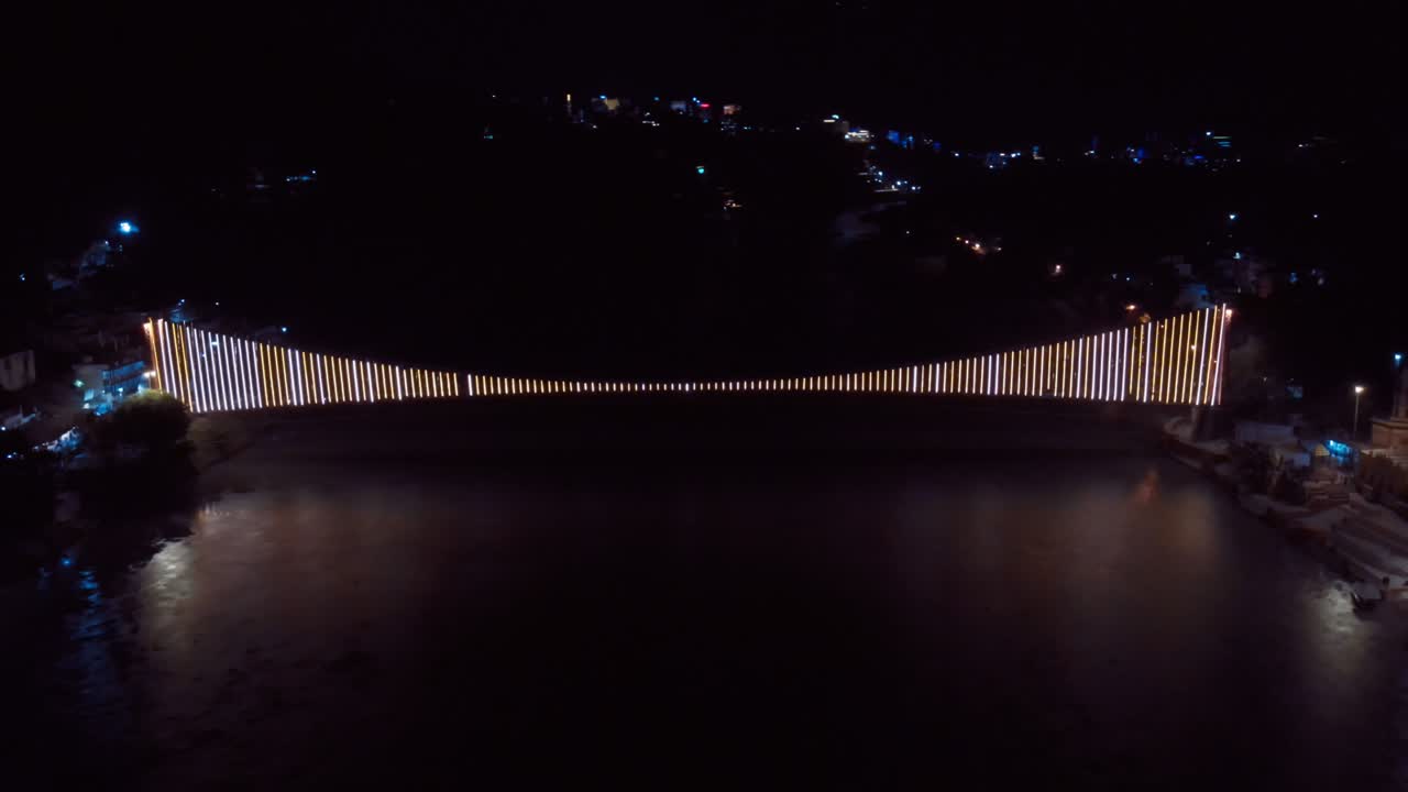 Aerial view Of Ram Jhula, Rishikesh, Uttarakhand at night during Diwali Festival in India.