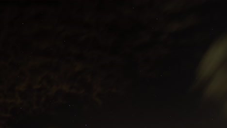 Clouds-passing-by-in-front-of-stars-time-lapse-background