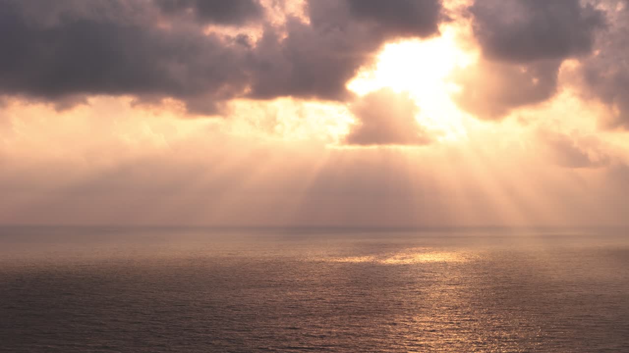 Golden sunset over the Laccadive sea, cloudy evening