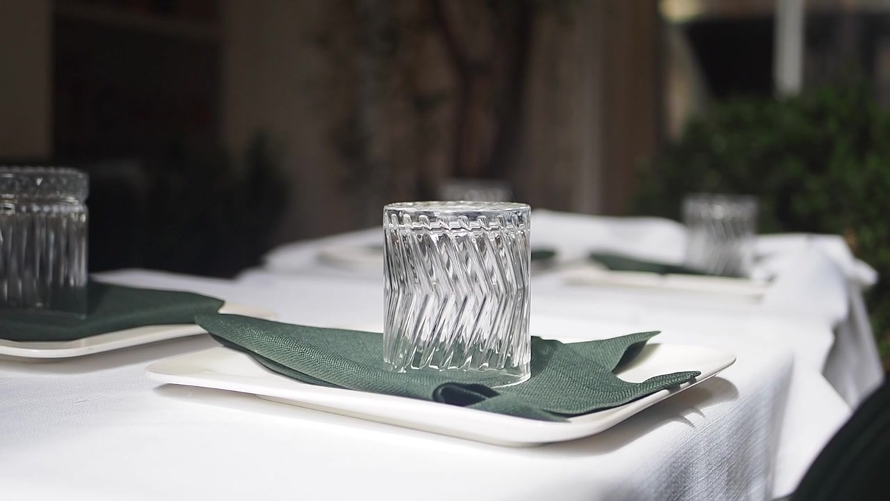 Empty Glass on a Set Restaurant Table