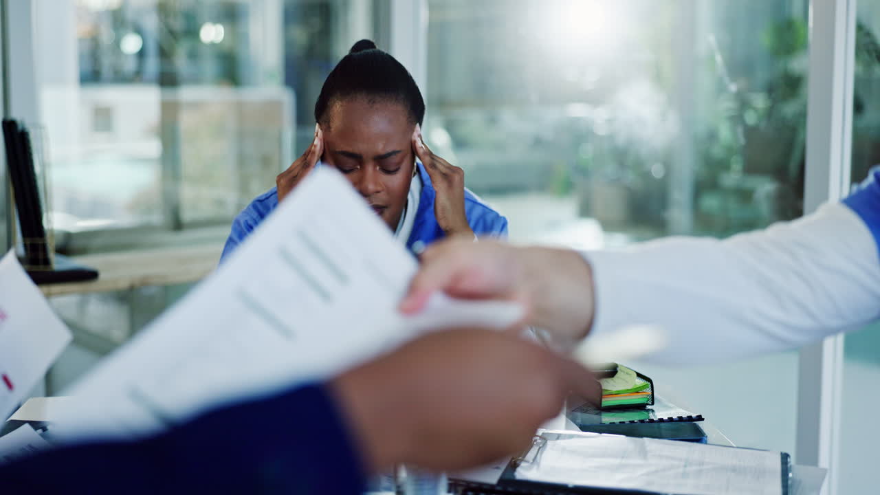 Stressed Nurse During Meeting