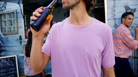 handsome man drinking beer