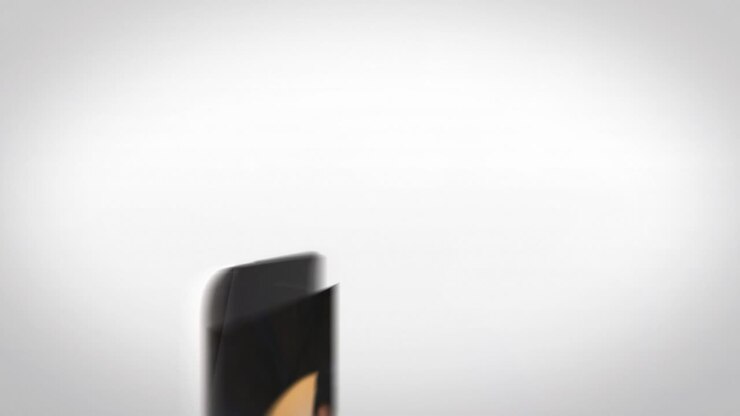 Tablet showing someone typing on a laptop