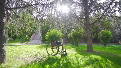 Empty-wheelchair.-Empty-wheelchair-on-the-grass.