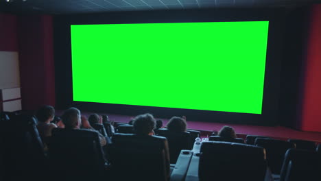 movie theater audience watching green screen
