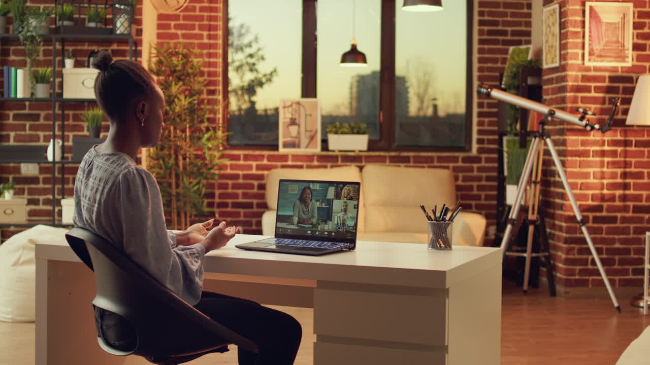 Worker chatting on videocall conference