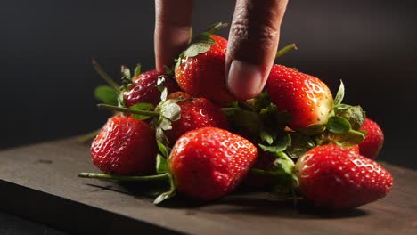 fresh strawberries on wooden board