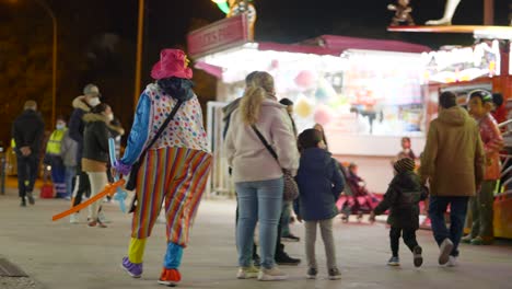 carnival night with clown and families