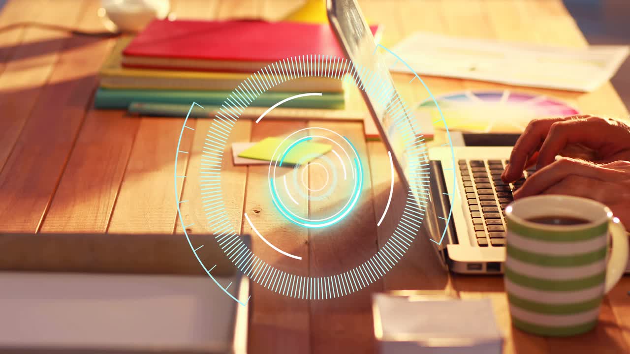 Adult male typing and holding card at desk, HUD activating over keyboard and authorizing payment