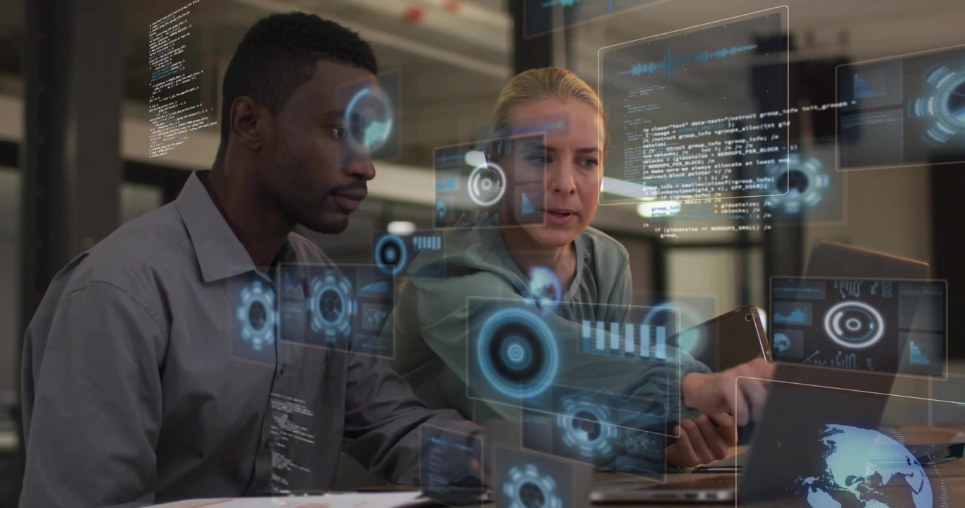 Woman pointing at laptop and activating tech HUD appearing between them while man analyzing charts