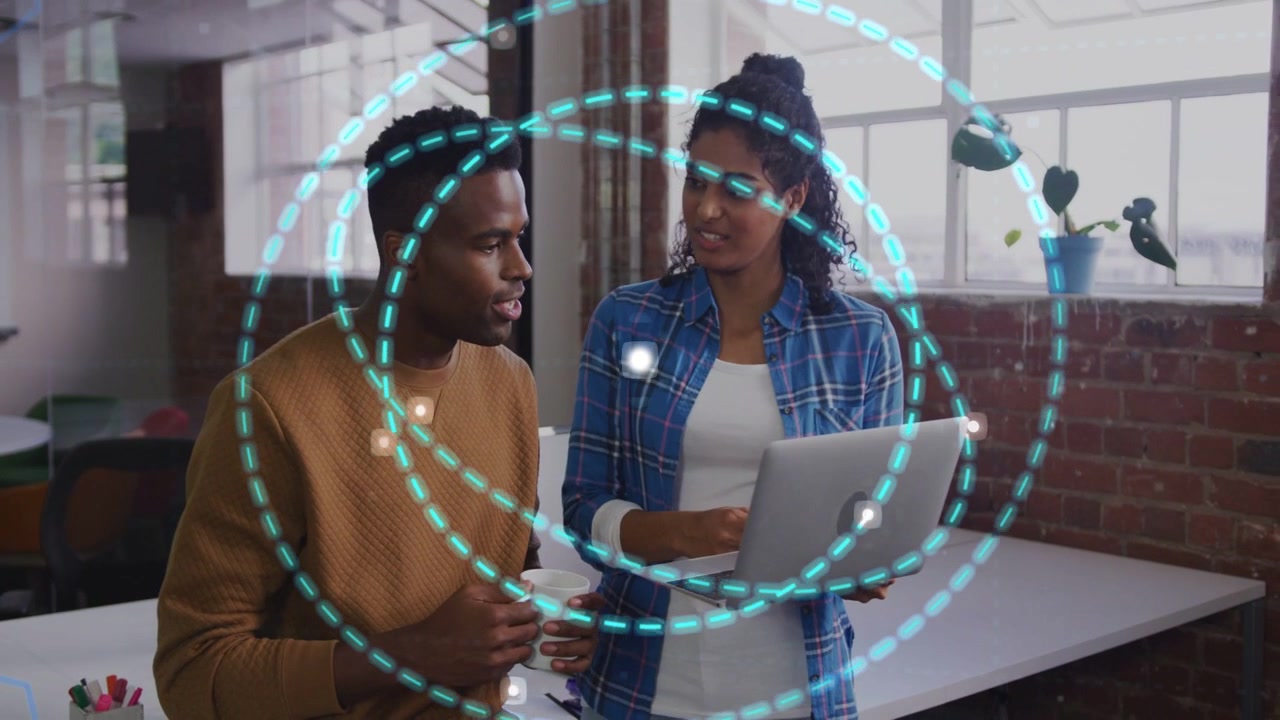 Woman holding laptop, man with mug, starting demoing in tech while glowing point forming cyan rings