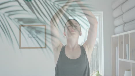 animation of green palm leaves over caucasian woman practicing yoga meditation in sunny room