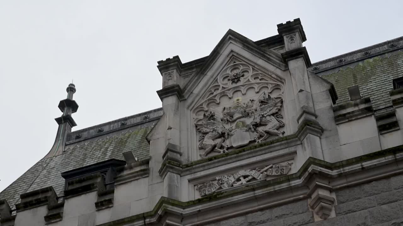 Close view of the ornate artwork and painted metal details that form Tower Bridge highlighting its craftsmanship and decorative structure