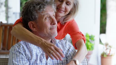 Senior-couple-romance-on-the-porch-at-home-4k