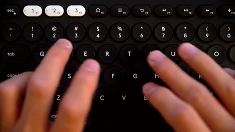 closeup view of typing hands