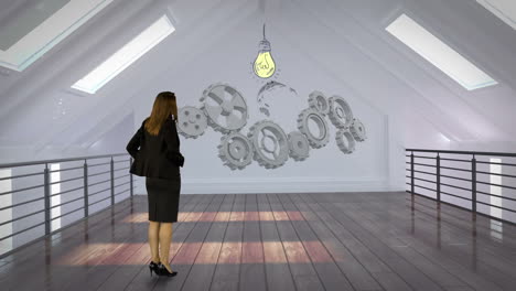 businesswoman looking at cogs and wheels projection