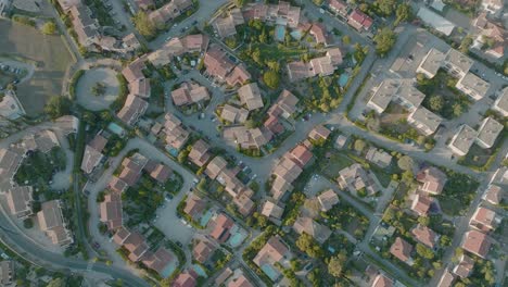 Top-down-drone-over-suburban-residential-area-suburbs-in-south-of-France,-Carqueiranne,-Var,-Provence-Alpes-Côte-d'Azur