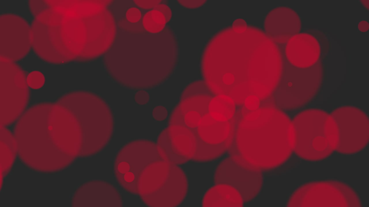 Striking Red Bokeh Lights Creating Contrast On Deep Black Canvas