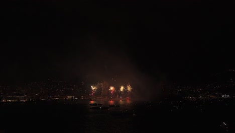 4k real fireworks explosion on smoke foggy black motion background loop sky on fireworks explosion