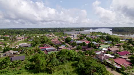drone view of rural residential area in smal-kalden suriname along the river, south america