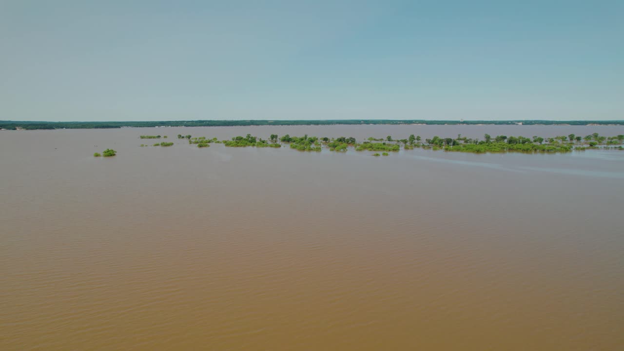 Aerial video of Lake Texoma flooding. A large number of submerged trees are visible.